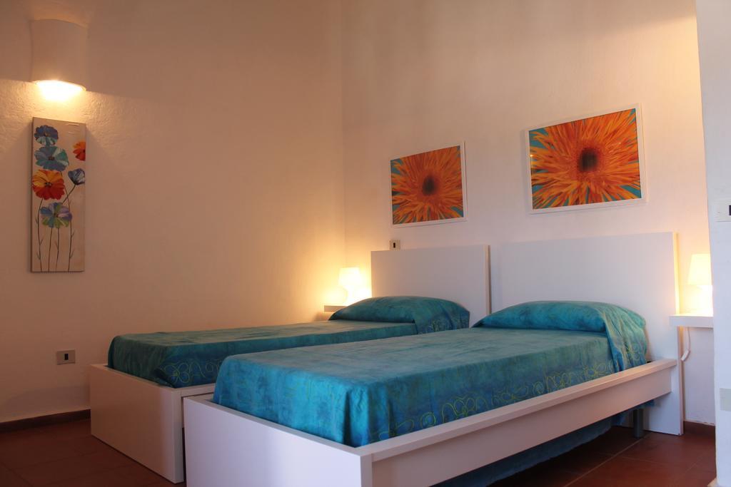 Апартаменты La Marmorata Vacation House Санта-Тереза-Галлура Номер фото