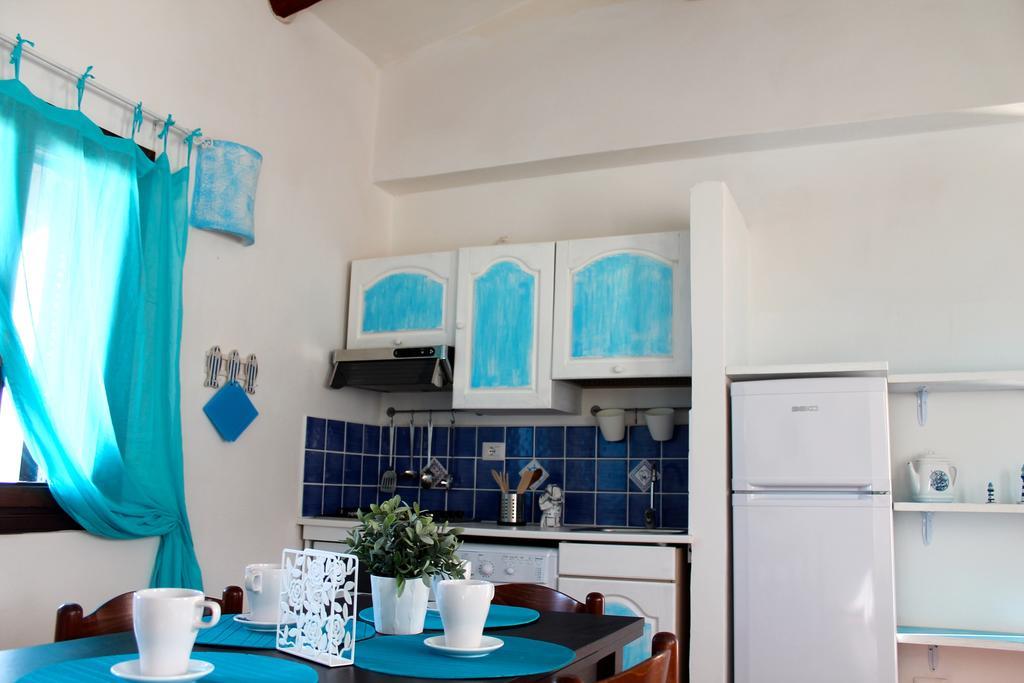 Апартаменты La Marmorata Vacation House Санта-Тереза-Галлура Номер фото