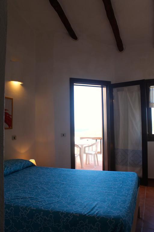 Апартаменты La Marmorata Vacation House Санта-Тереза-Галлура Номер фото