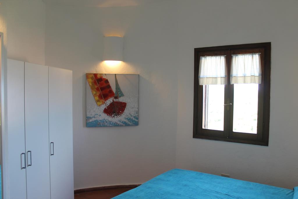 Апартаменты La Marmorata Vacation House Санта-Тереза-Галлура Номер фото