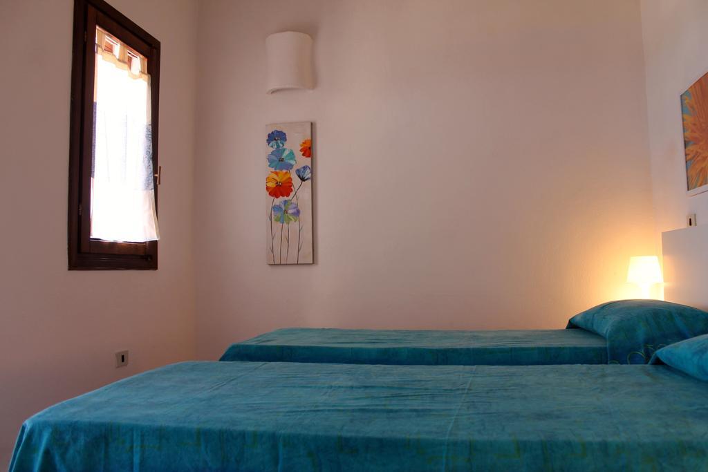 Апартаменты La Marmorata Vacation House Санта-Тереза-Галлура Номер фото