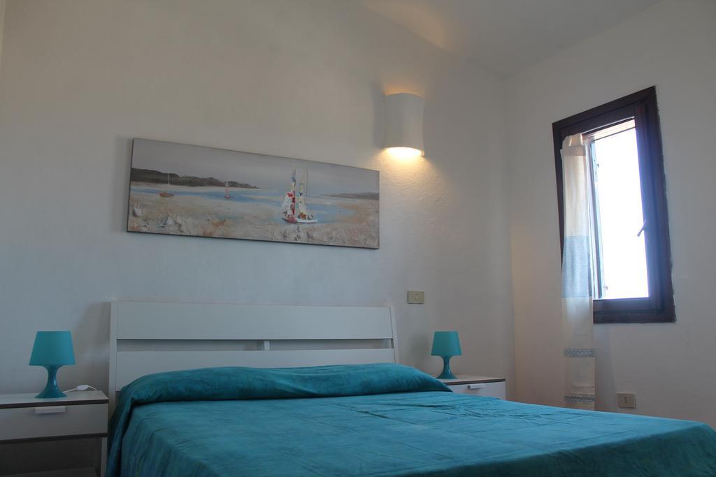 Апартаменты La Marmorata Vacation House Санта-Тереза-Галлура Номер фото