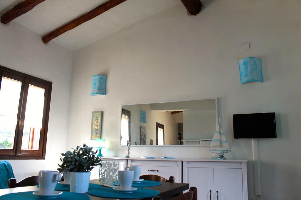 Апартаменты La Marmorata Vacation House Санта-Тереза-Галлура Номер фото